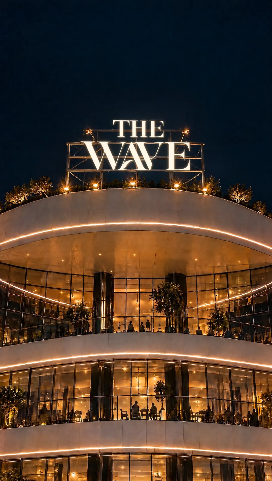 The rooftop sign at night